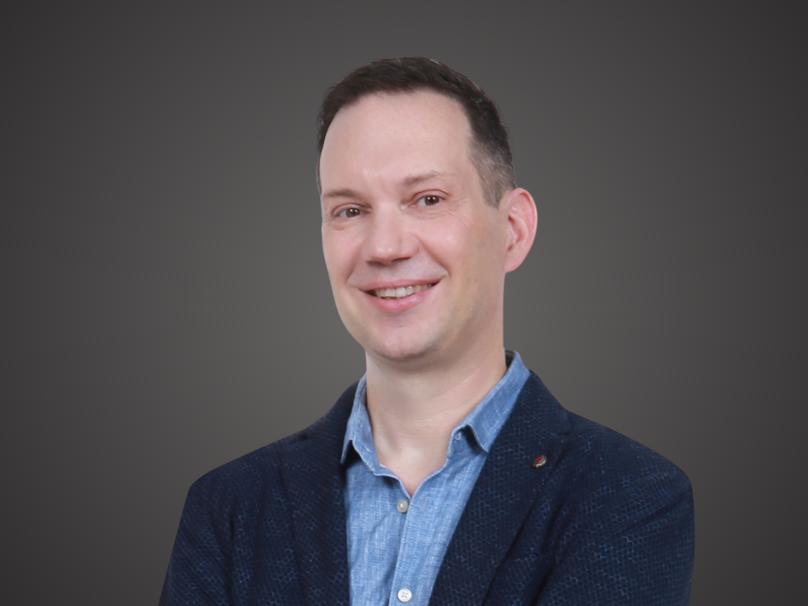 Adrian Gschwend: Building AI Systems for Government and Enterprise